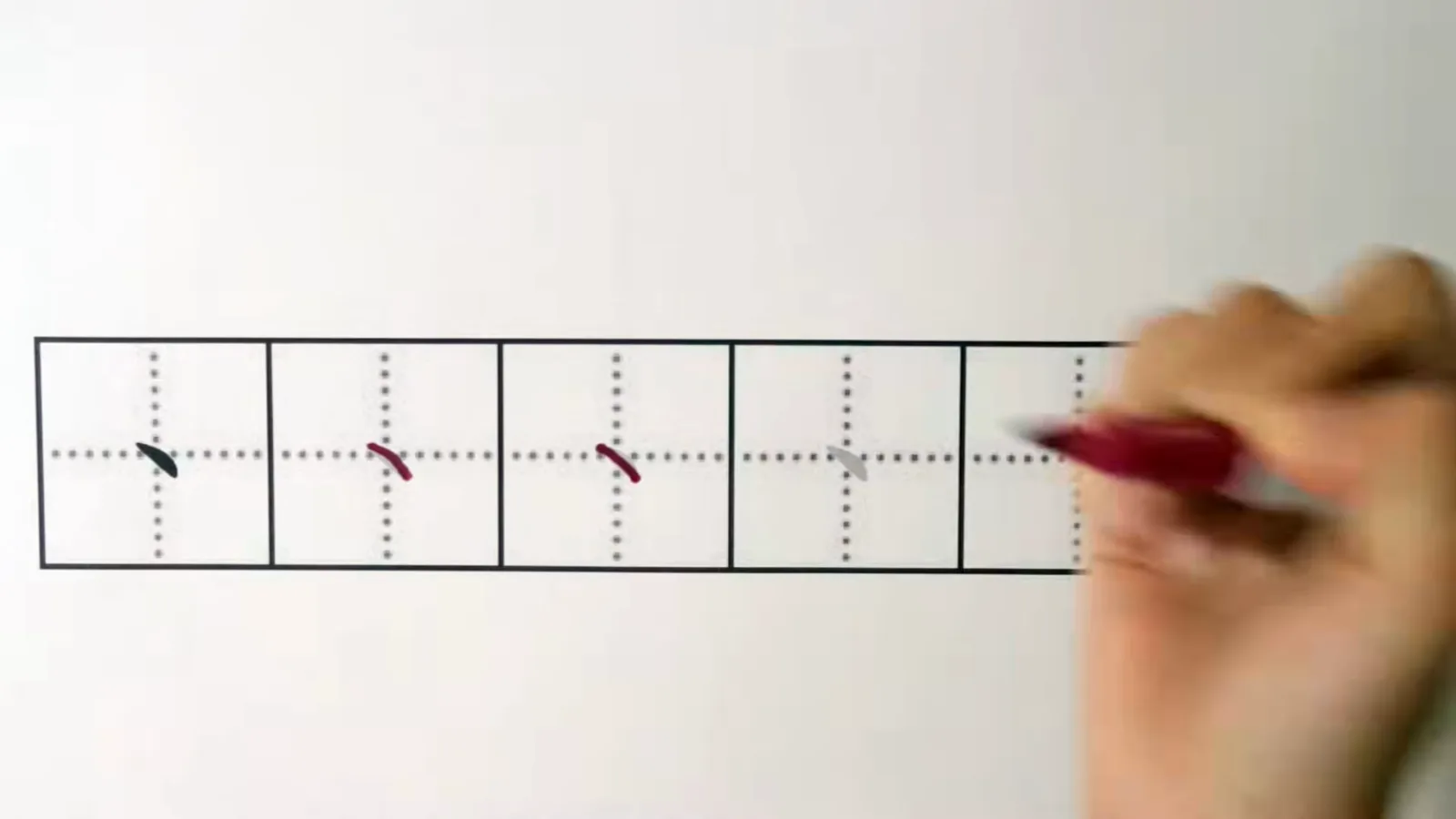 The dot stroke diǎn shown as a short angular press with a directional arrow illustrating how to land a crisp punctuation mark in Chinese writing